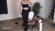 Miss Amy Douxxx pees on the toliett box 