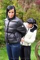 Jill ties her friend in shiny downjackets