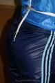 Alina tied and gagged in shiny nylon clothes