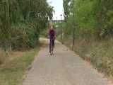 Get a Video with Sandra riding her bike enjoying her shiny nylon Rainwear