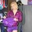 Pia enjoying a cupboard full of shiny nylon clothes trying on purple shiny nylon shorts and rain jacket (Pics)