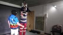 Myxxxy bound, gagged and suspended in shiny nylon Rainwear
