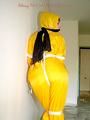 Leonie tied and gagged outdoor wearing shiny yellow rainwear (Pics)