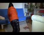 Mara sorting newspapers and lolling on the floor and the sofa wearing sexy shiny nylon downwear (Video)