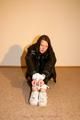 One of our archive girls bound and gagged in shiny nylon down