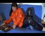 Mara sorting newspapers and lolling on the floor and the sofa wearing sexy shiny nylon downwear (Video)