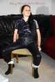 Lucy tied and gagged with rope and gag on a chair wearing a sexy black shiny nylon jumpsuit (Pics) 