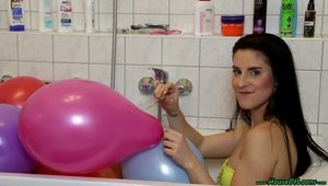 taking a bath with balloons [nails, scissors lighter]