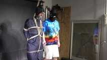 Myxxxy bound and gagged in a shiny nylon Rainsuit