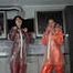 Miss Petra and new model Miss Jessica in AGU raingear  layered with transparent raingear