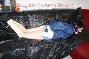 LUCY tied and gagged with ropes and a cloth gag wearing a supersexy white shiny nylon shorts and blue rain jacket (Pics)