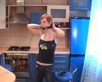 Alice Lee - Short-haired redhead left bound and barefoot in the kitchen (video)