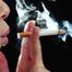 A young lady showing her smoking skills in a closeup video 
