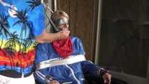 Watch Myxxxy bound and gagged in shiny nylon Rainwear with multiple gags and breath control