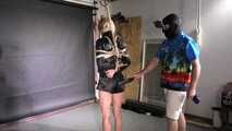 Myxxxy bound gagged and spanked in shiny nylon Shorts and Windbreaker. Mouth stuffed with panties and tapegagged.