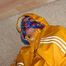 Katharina tied and gagged in a yellow rainsuit