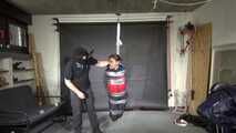 Marie taped and suspended in shiny nylon Rainwear