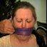 46 Yr OLD REAL ESTATE AGENT'S IS MOUTH STUFFED, WRAP VET TAPE GAGGED, CLEAVE GAGGED, HANDGAGGED AND IS TIGHTLY TIED TO A CHAIR (D66-5)