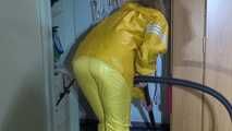 Pia wearing sexy yellow shiny nylon rainwear cleaning up the studio (Video)