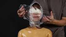 Xiaomeng in Transparent Latex and Bagged