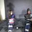 Aiyana and Ms Ungeniert bound and gagged in shiny nylon Rainwear