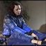 Luly ties, gagges and hoodes herself in bed wearing a sexy blue rain pants and an blue/black down jacket (Video)