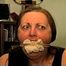 46 Yr OLD REAL ESTATE AGENT'S IS MOUTH STUFFED, HANDGAGGED, BANDANNA CLEAVE AND OTM GAGGED, ROPE GAGGED WITH HANDS TIGHTLY TIED WITH THIN RAWHIDE (D72-10)