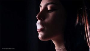 Lera is smoking cork cigarette with French inhales