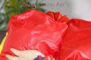 Lucy wearing a sexy shiny nylon shorts and two rain jackets feeling breath control (Pics)