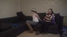 Elysa roped on couch 