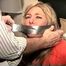 42 YEAR OLD LAWYER IS MOUTH STUFFED DUCT TAPE WRAP GAGGED, HOG-TIED, BAREFOOT, TOE-TIED ON THE BED (D69-1)