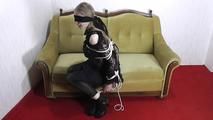 Sexy dressed girl bound with ropes 2/2