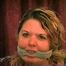 BBW MICHELLE IS CLEAVE GAGGED 3 TIMES AND TIGHTLY TIED TO A CHAIR (D44-7)