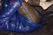 Sexy Sonja changing clothes to a brown down pants and a blue down jacket and lolling on the sofa (Pics)