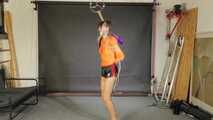 Lana bound and gagged in shiny Shorts and Windbreaker 