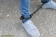 Cuffed to a heavy container