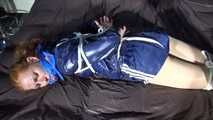 ***RONJA*** being tied and gagged on a sofa with ropes and a clothgag wearing a sexy blue shiny nylon shorts and a rainjacket (Video)
