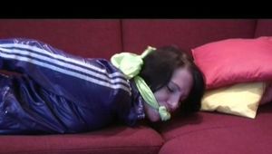 0320 min video with Simone tied and gagged in shiny nylon shorts