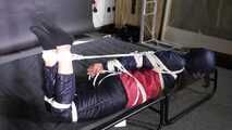 Marie bound and gagged in shiny nylon Rainwear