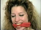 TAMARA IS MOUTH STUFFED, CLEAVE GAGGED, OTM GAGGED, HANDGAGGED & DOES LOTS OF GAG TALKING (D51-7)