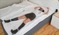 Spread eagle on bed
