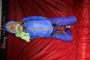 Sexy Sonja being tied and gagged with ropes and a clothgag hanging wearing a sexy rainwear combination (Pics)