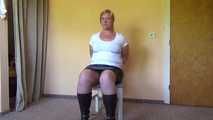 Cuffed on a chair 001