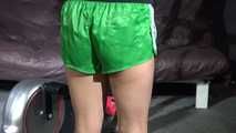 Watching sexy Sandra during her workout wearing a sexy green shiny nylon shorts and a black top (Video)