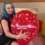 nail2pop big balloons on bed