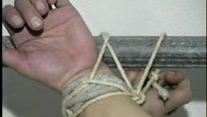 WRAPPED TAPE GAGGED, PANTY-LESS, HIGH HEELED PUSSY HOSTAGE (D20-3)