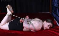 Lesa - hogtied and tickled on bed