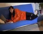Mara sorting newspapers and lolling on the floor and the sofa wearing sexy shiny nylon downwear (Video)