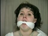 19 Yr OLD JENNIFER IS MOUTH STUFFED, TAPE GAGGED, TIED WITH ARMS OUT AND TO 2 PILLARS & CLEAVE GAGGED (D48-10)d, bondage