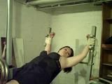 Sandra tied on a gym 1/2